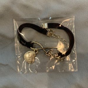 Silver and leather “Sister” bracelet